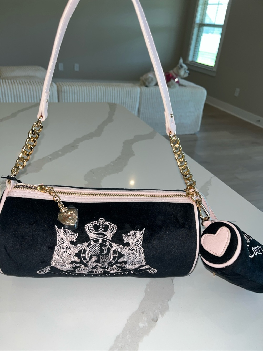 Black and pink barrel bag